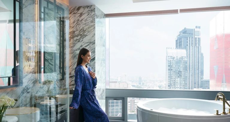 Chatrium Grand Bangkok hotel pool and city setting