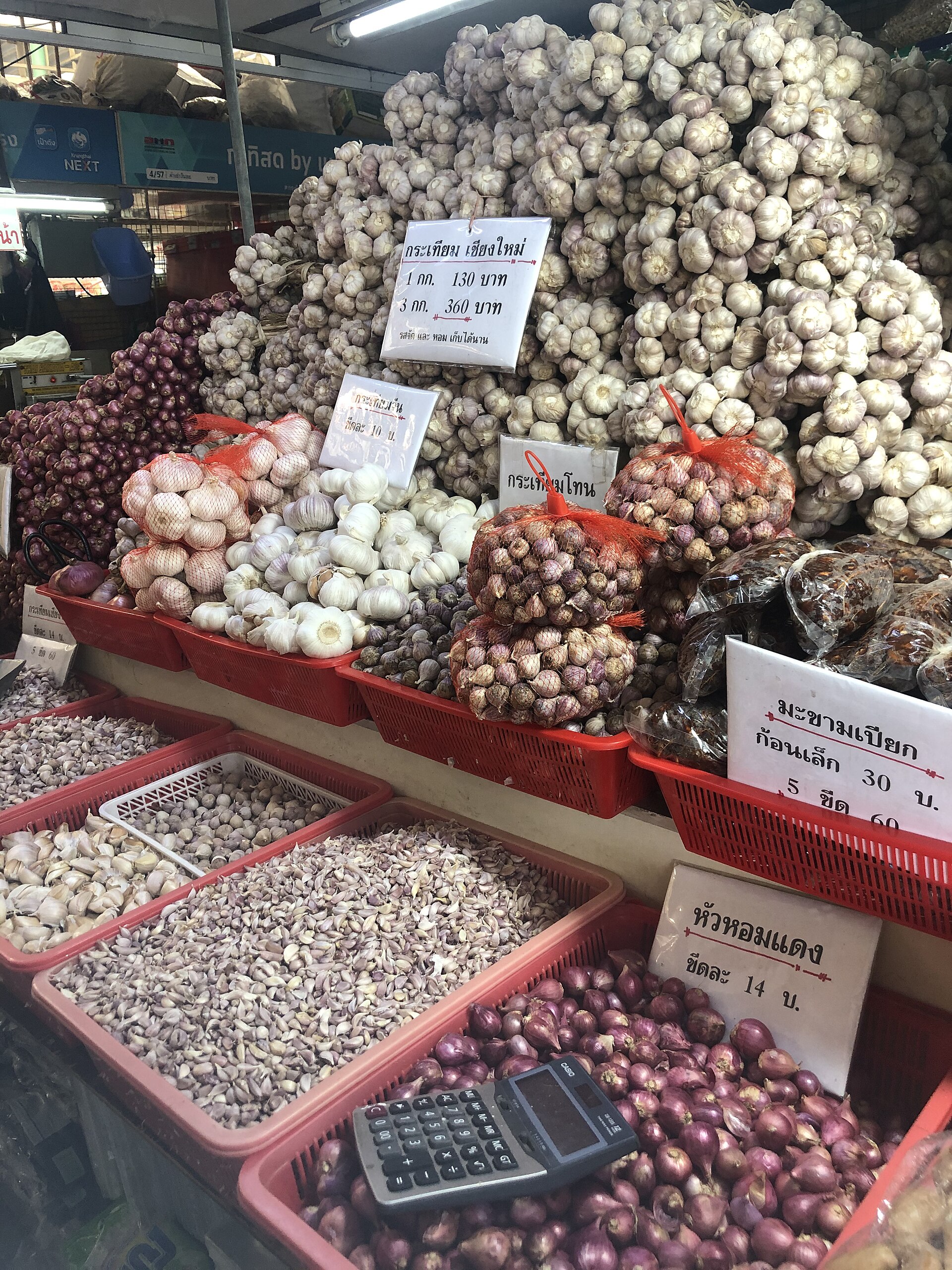 Garlic and produce for sale at Or Tor Kor Market