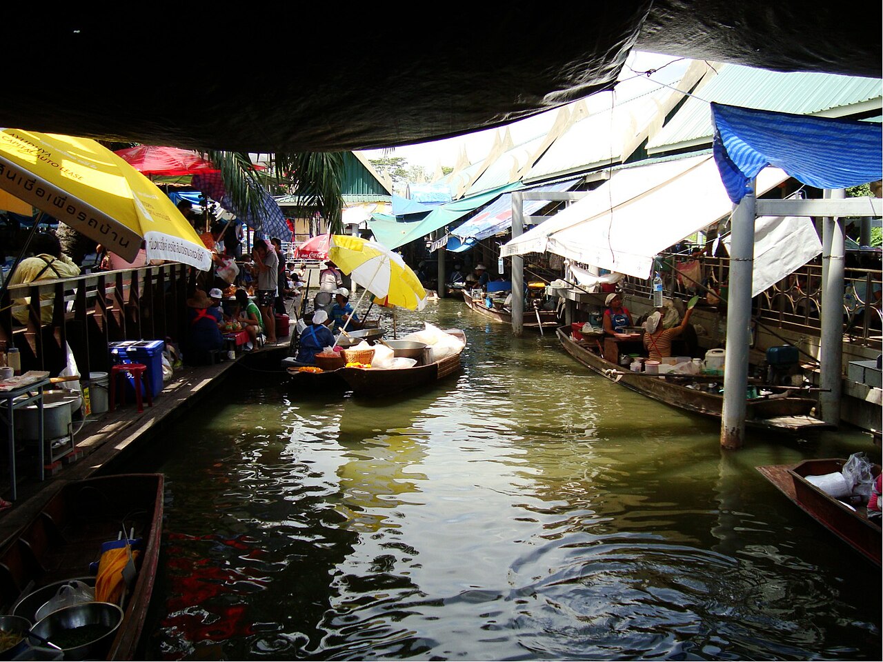 Canal-side market scene at Taling Chan Floating Market