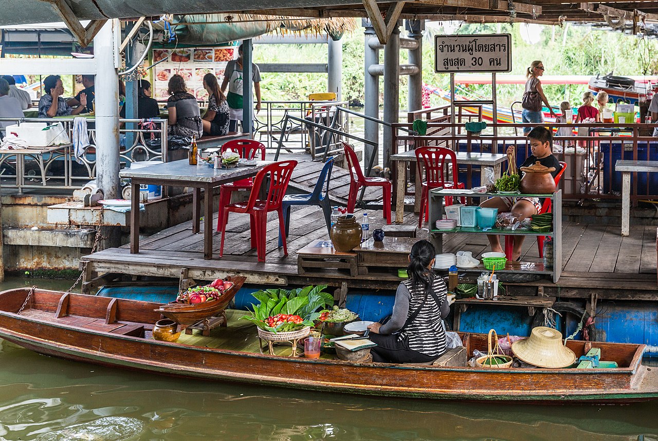 Boat food scene around Taling Chan Floating Market