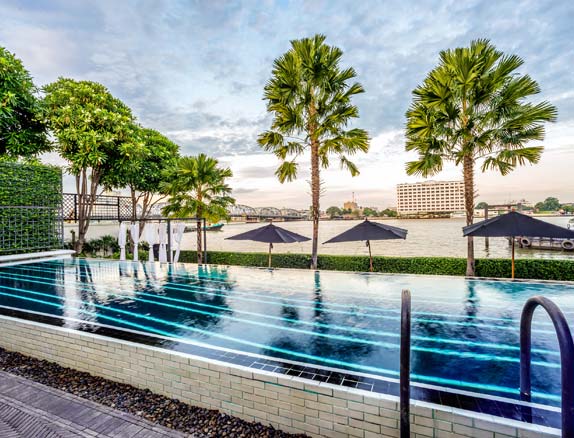 Riverside infinity pool at The Siam Bangkok