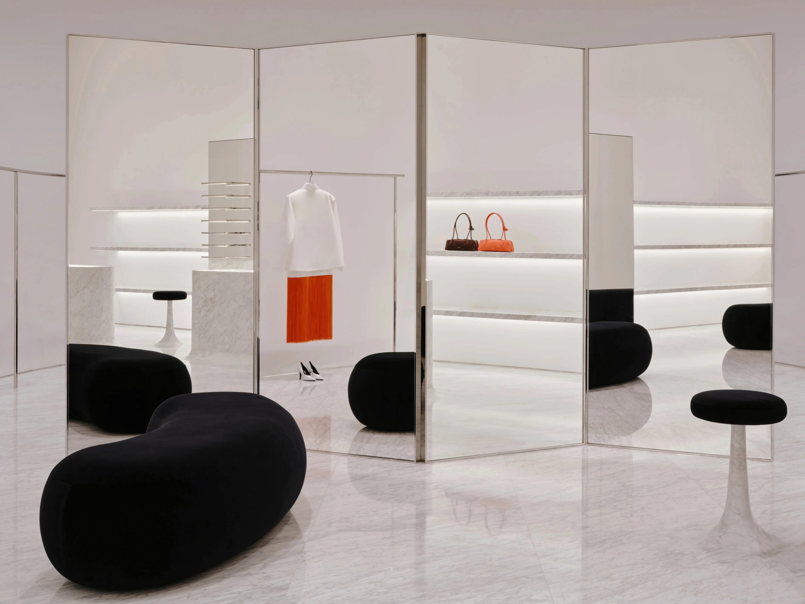Curved interior of Alaïa Bangkok at Central Embassy
