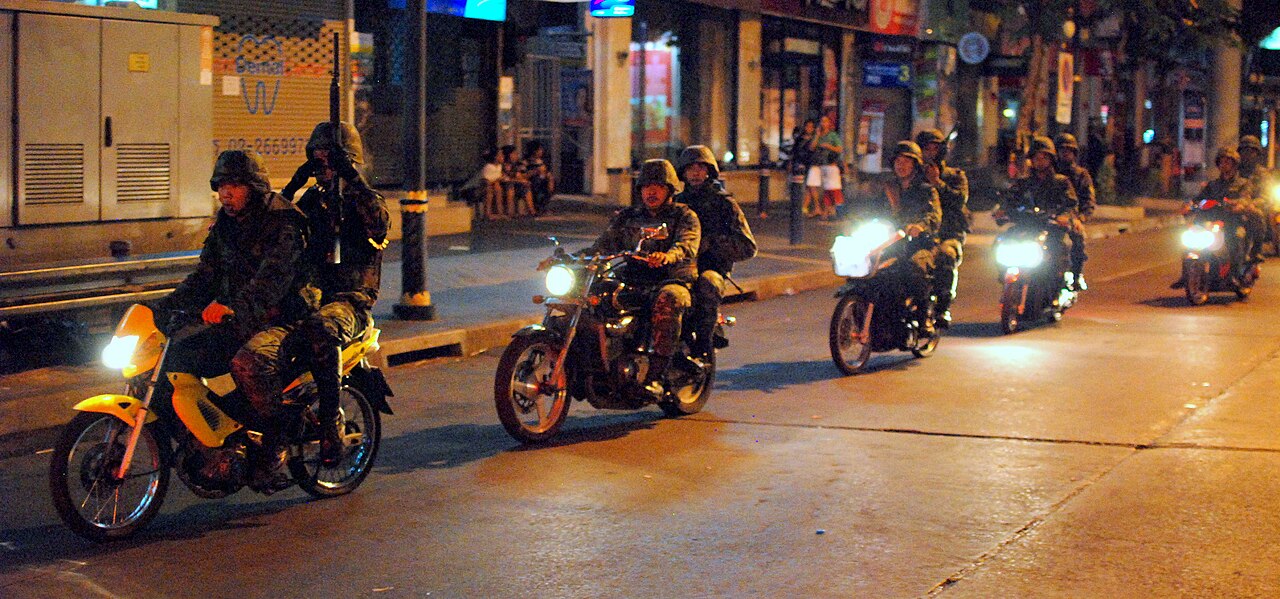 Bangkok taxis and traffic after dark in Silom