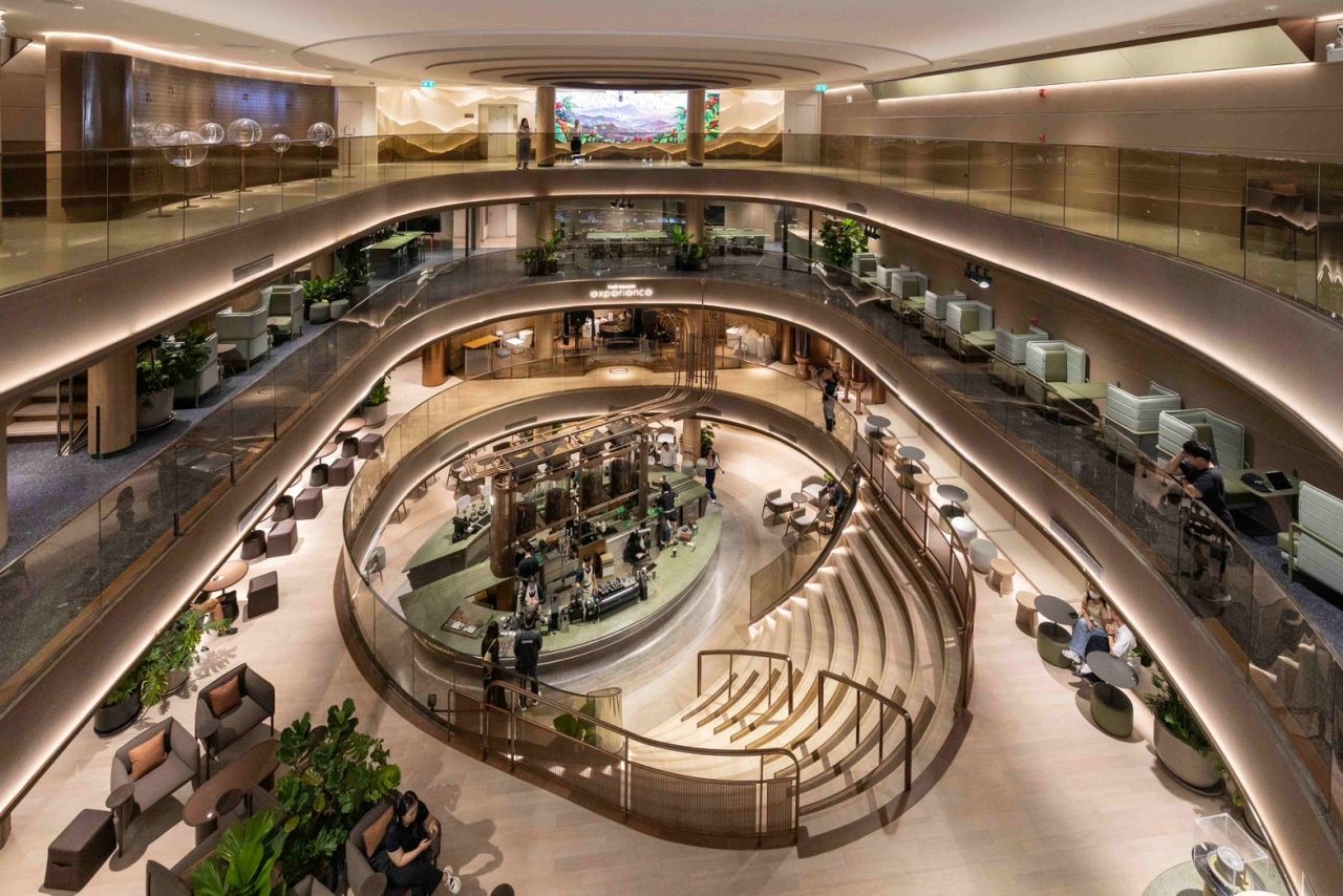Circular communal and event space inside Café Amazon Experience Ari