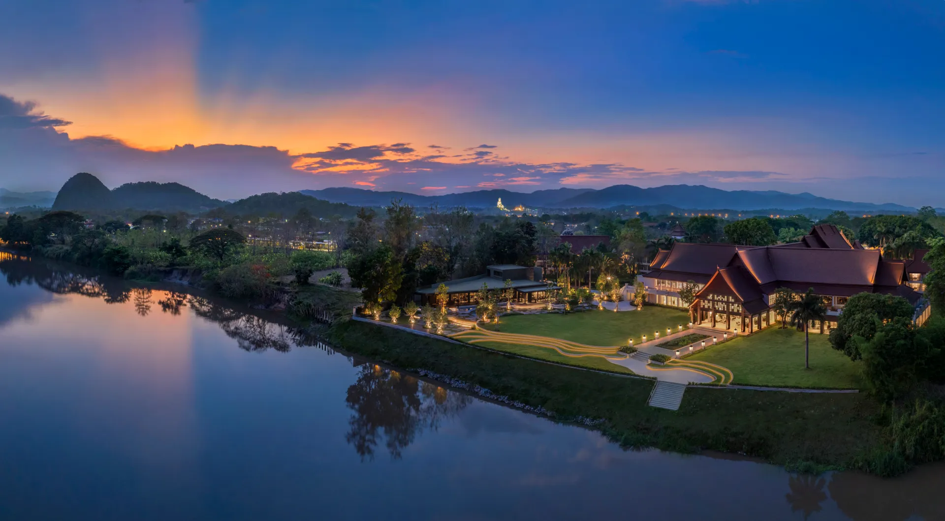 Kahavadi Chiang Rai beside the river at twilight