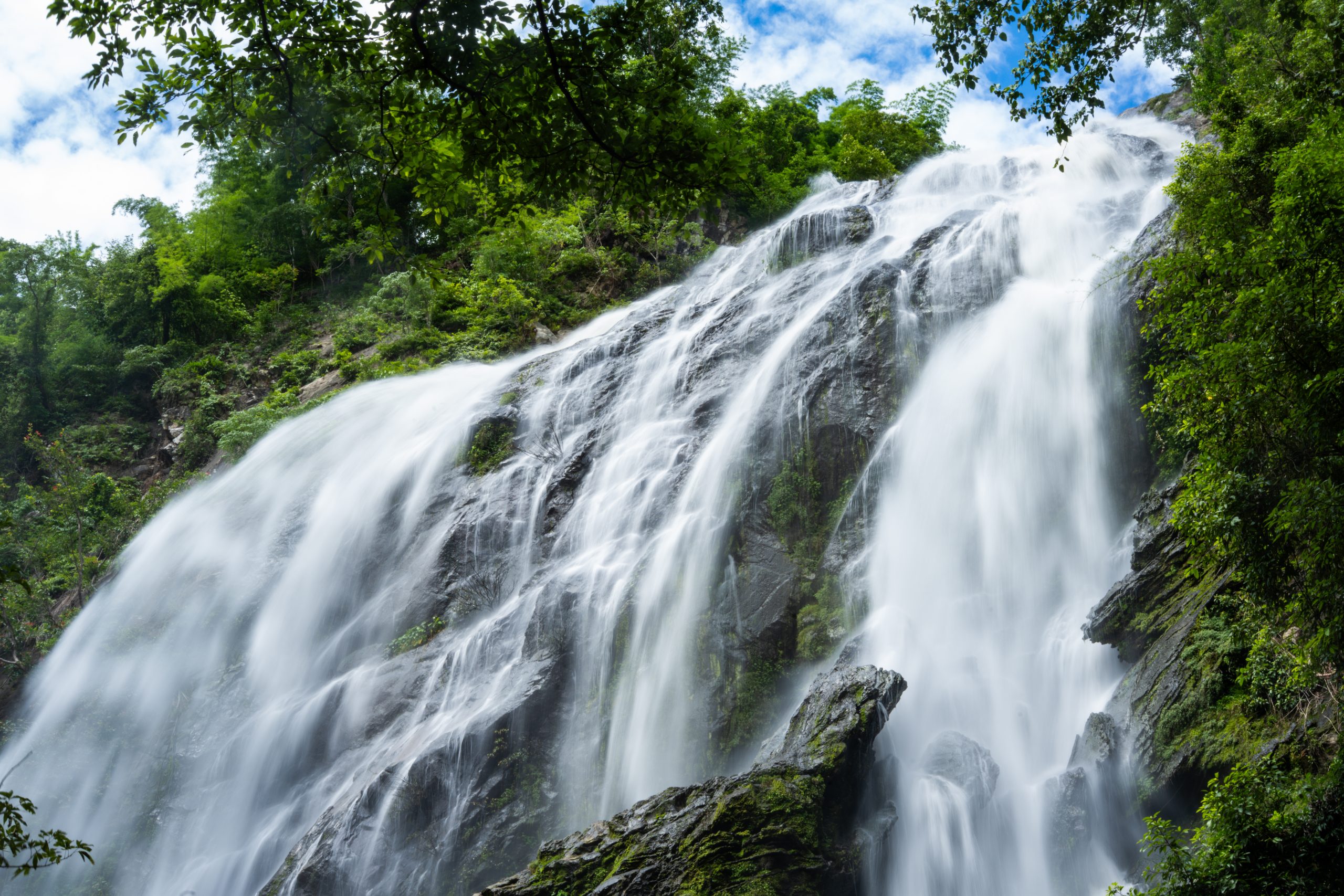 Rocky approach and pool beneath Khlong Lan Waterfall