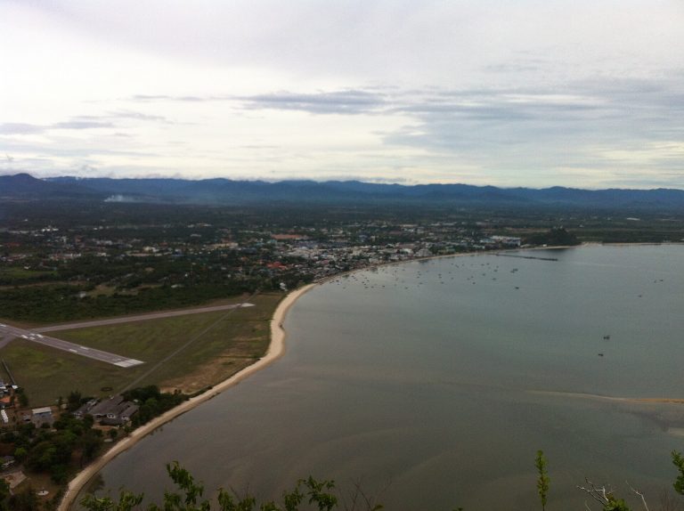Aerial view of Prachuap Khiri Khan town between the sea and limestone hills