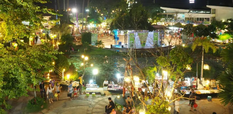 Visitors at Ton Tann Market in Khon Kaen after dark