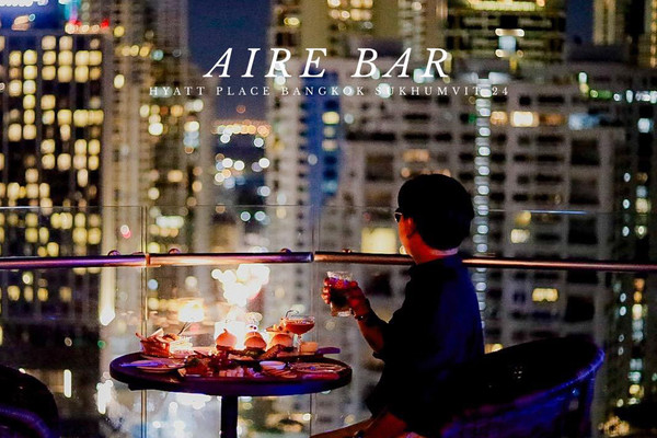AIRE BAR guest dining above Bangkok after dark