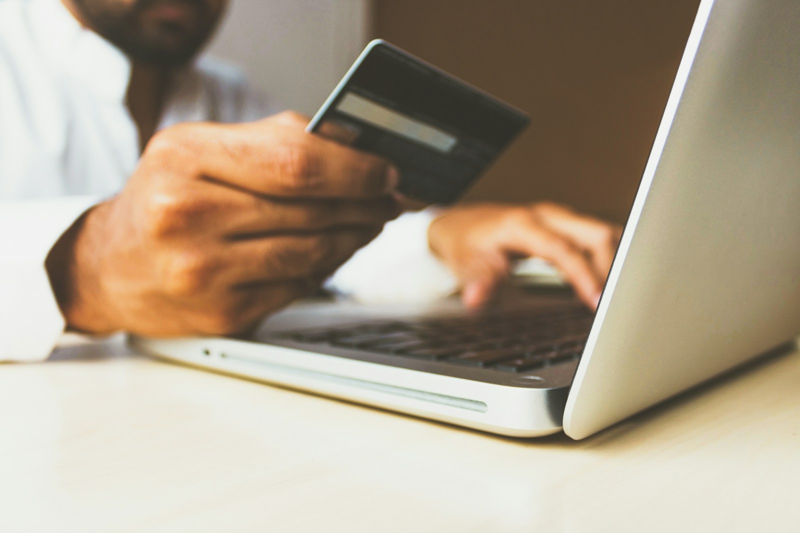 A bank card and smartphone used for digital payment planning