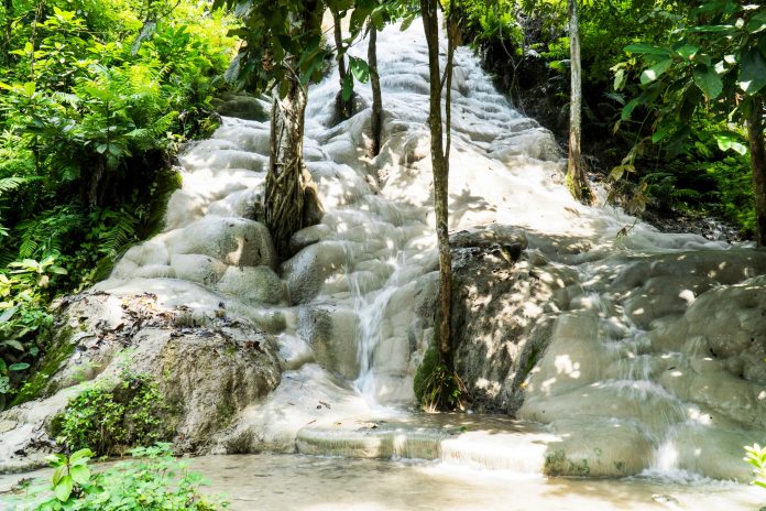 The white limestone cascades of Bua Tong Waterfall in Chiang Mai