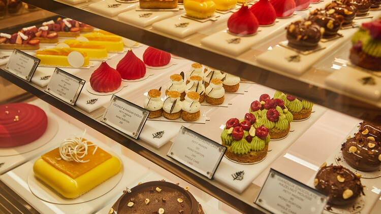 Signature cakes in the Café Madeleine display