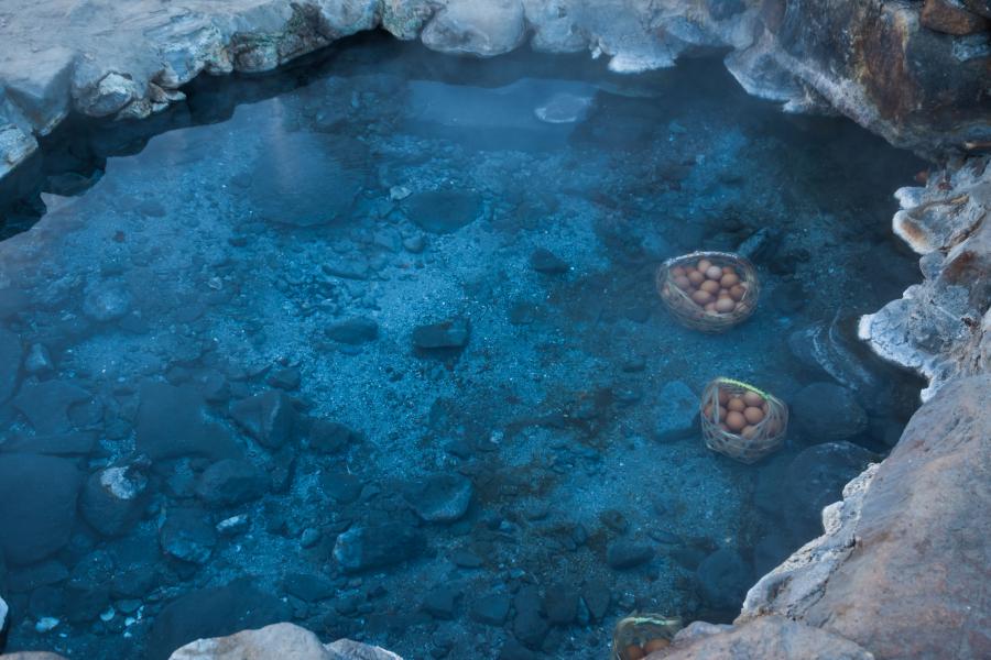 Baskets of eggs cooking in the hot water at Chae Son National Park