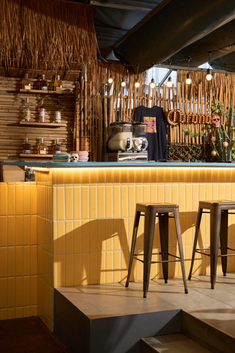 Colourful bamboo-lined bar at Cholos in Bangkok
