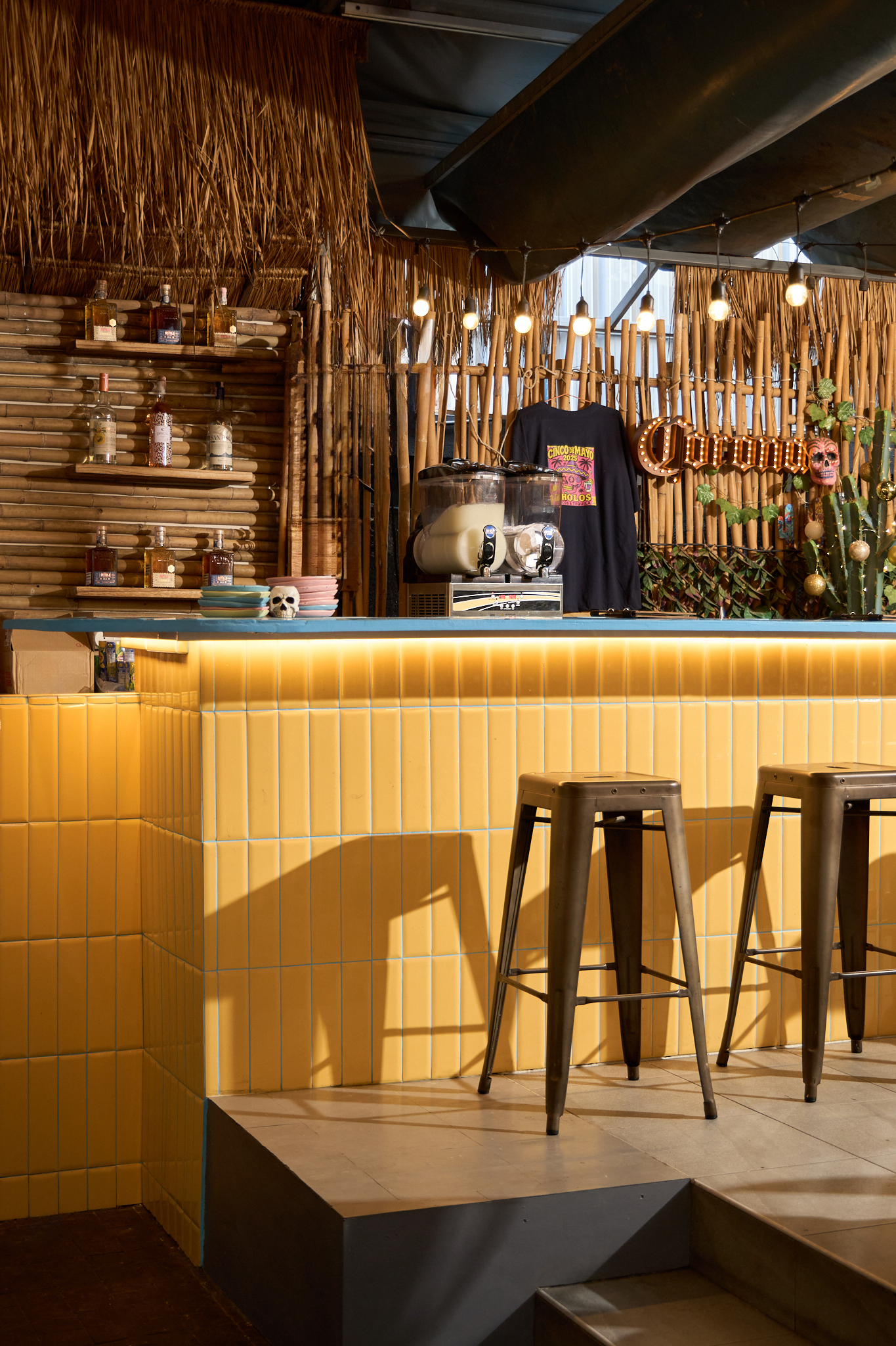 Colourful bamboo-lined bar at Cholos in Bangkok