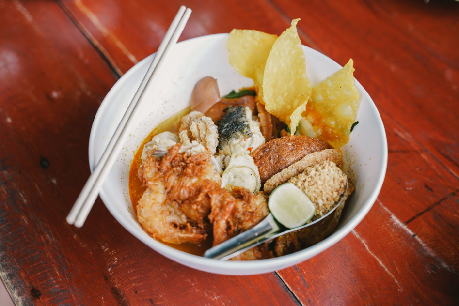 Seafood sour-curry noodles served in Chumphon