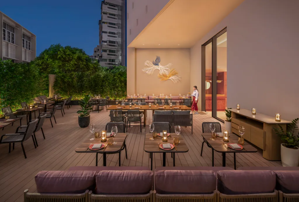 Terrace seating at Colette restaurant in KROMO Bangkok