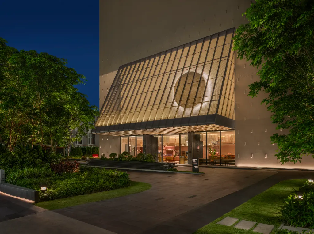 KROMO Bangkok hotel exterior at twilight