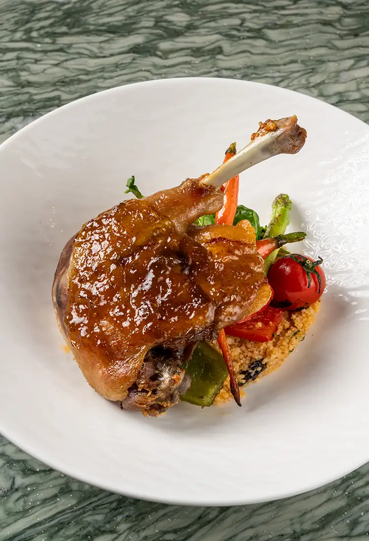 Duck confit served at Florae Bangkok