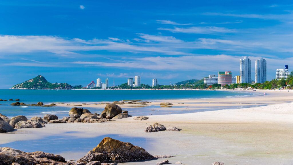 Wide sandy shoreline at Hua Hin Beach