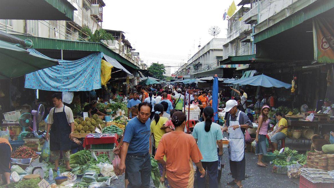 Vendors and produce at Khlong Toei fresh market