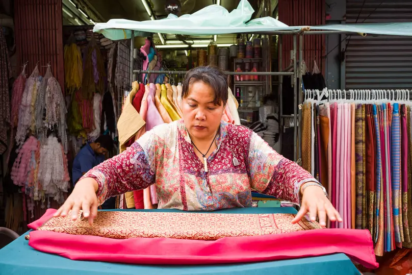 Colourful textiles for sale at Phahurat Market in Bangkok