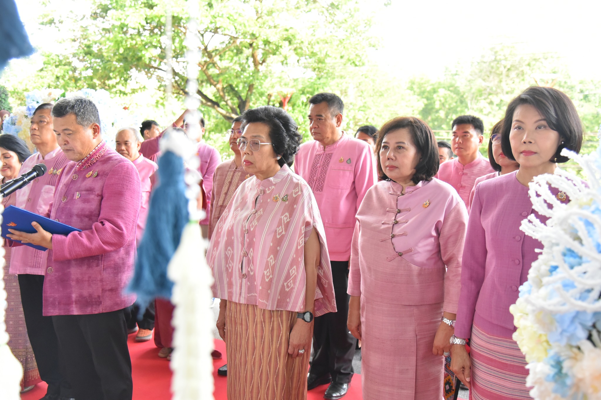 Participants gathered around an opening activity at the Lampang textile festival