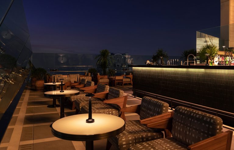 Window seating at Spire Rooftop Bar in Dusit Thani Bangkok