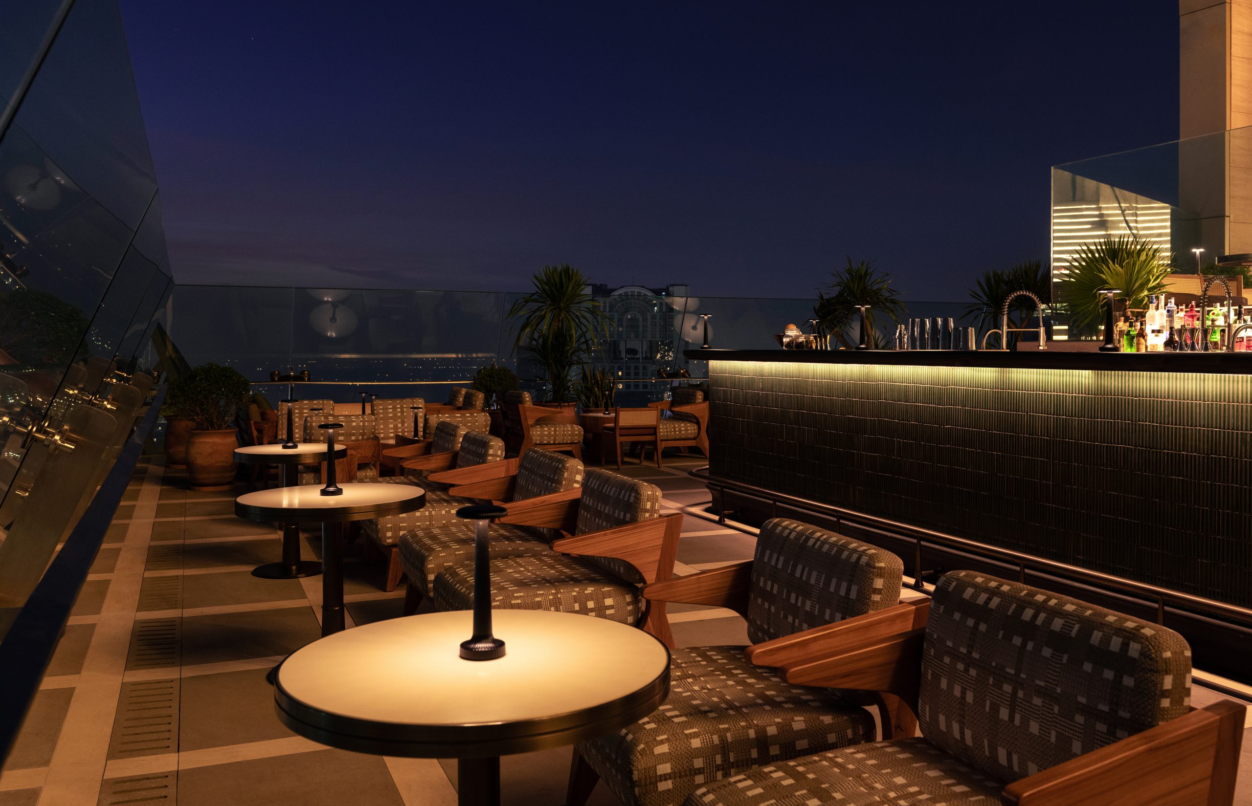 Window seating at Spire Rooftop Bar in Dusit Thani Bangkok