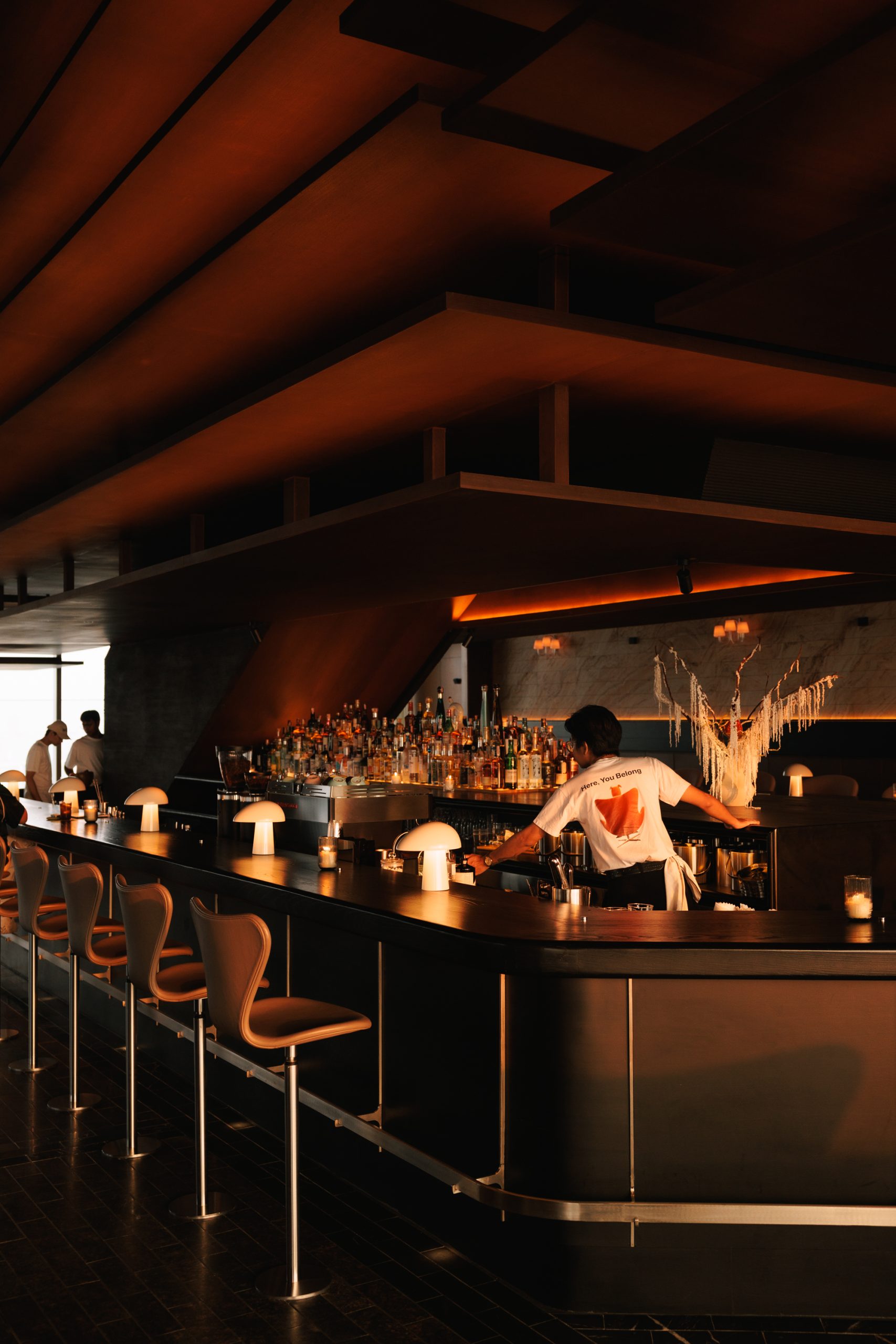 Customised Series 7 stools lining the bar at The Norm