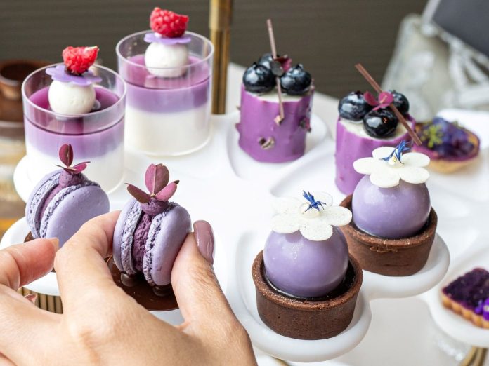 Hana Afternoon Tea floral stand and lavender-coloured pastries
