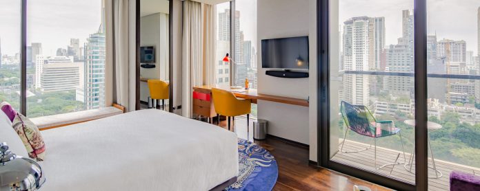 Hotel Indigo Bangkok premium balcony room King Premium Sunset Garden View room with balcony at Hotel Indigo Bangkok
