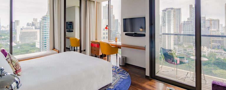 King Premium Sunset Garden View room with balcony at Hotel Indigo Bangkok