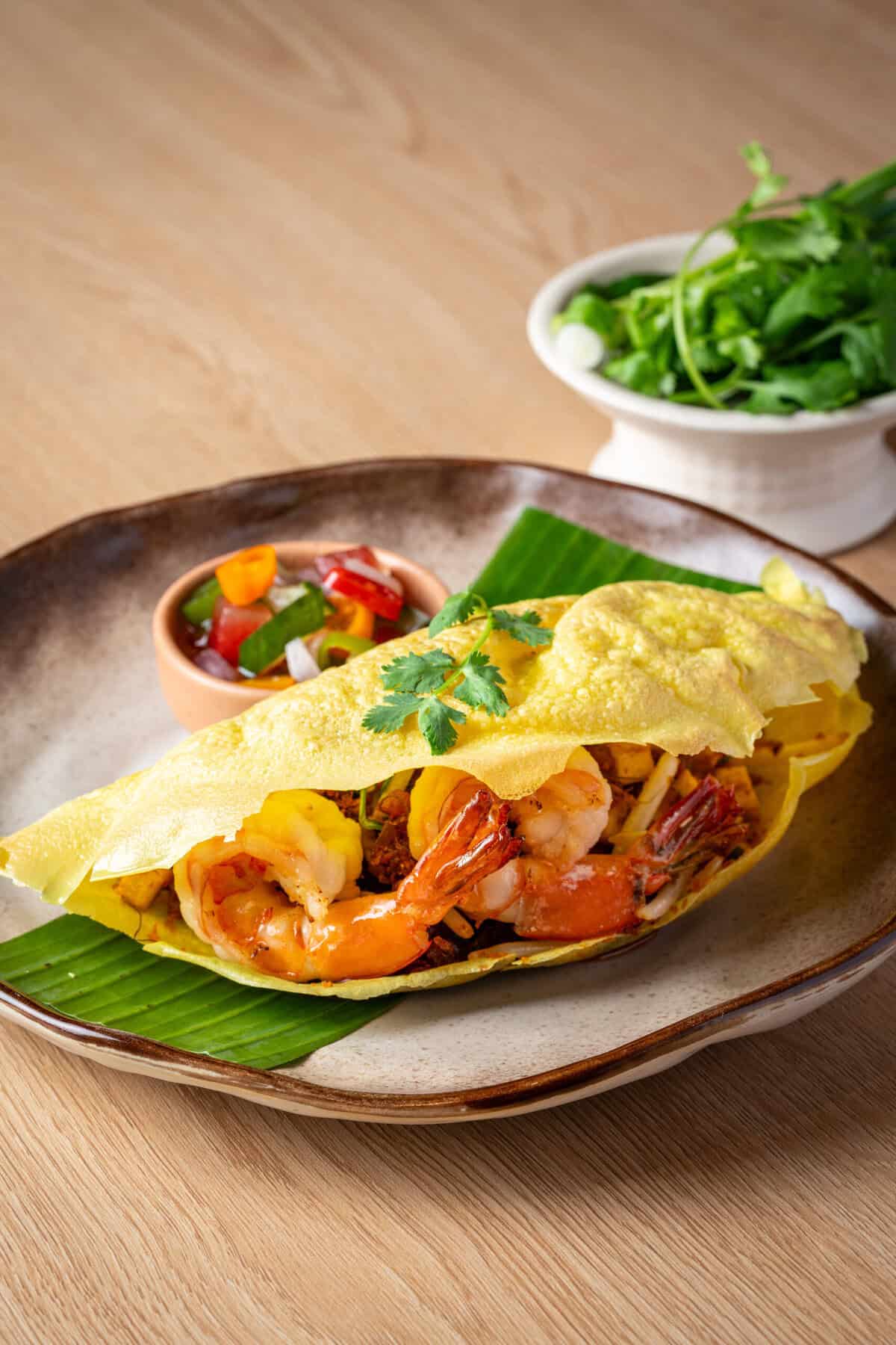 Crisp shell filled with seafood at Khum Hom Bangkok