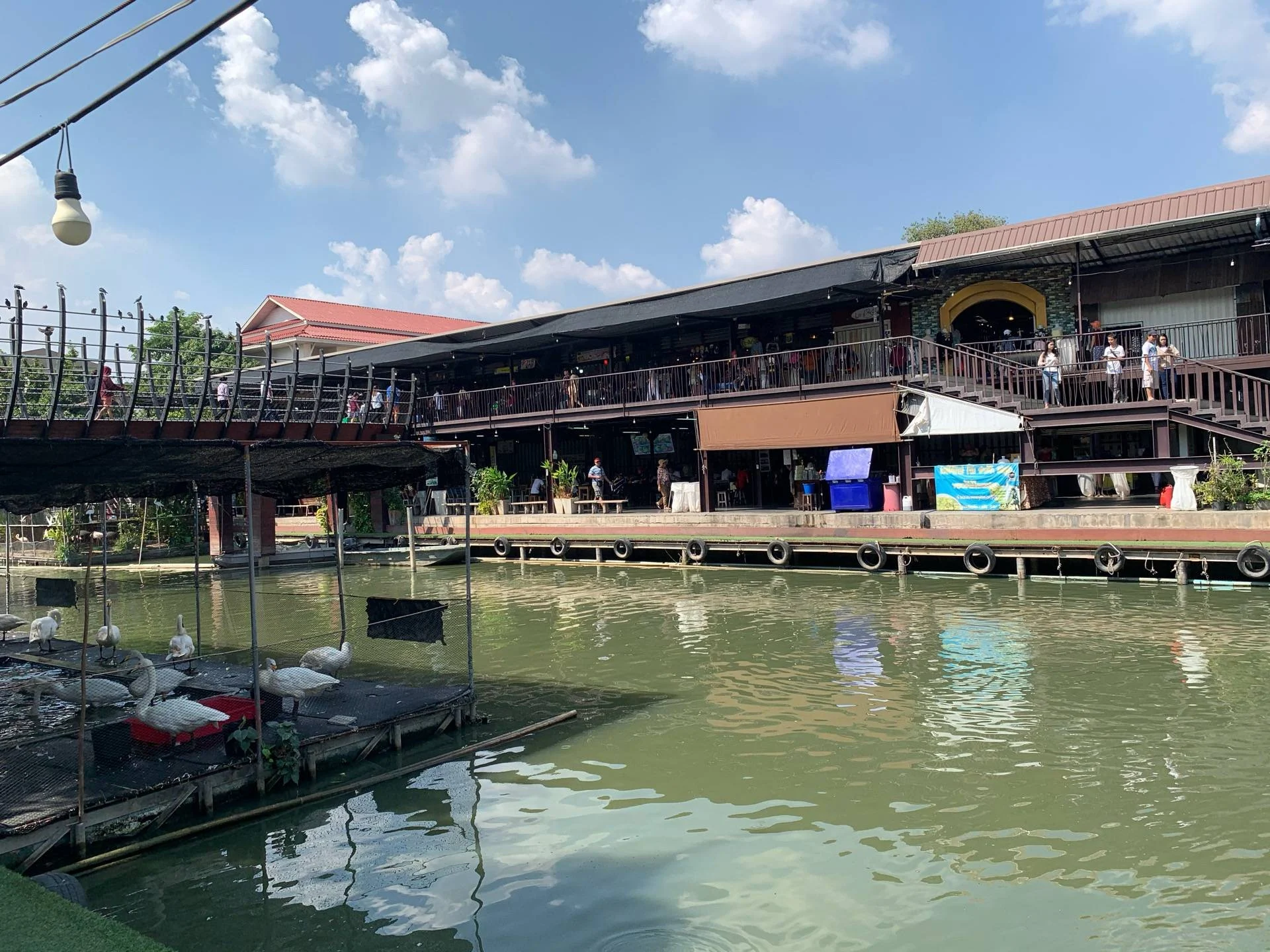 Wooden walkways and stalls at Kwan Riam Floating Market
