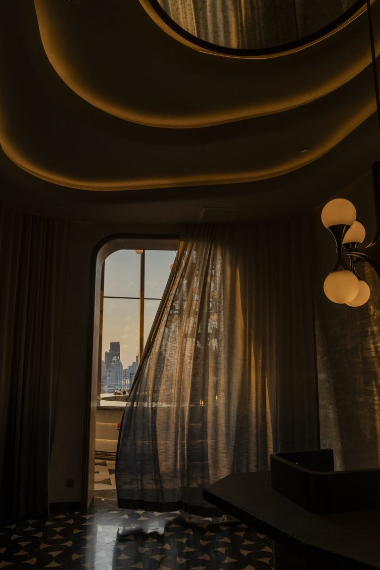 Moody arrival space at Piscari in Andaz One Bangkok