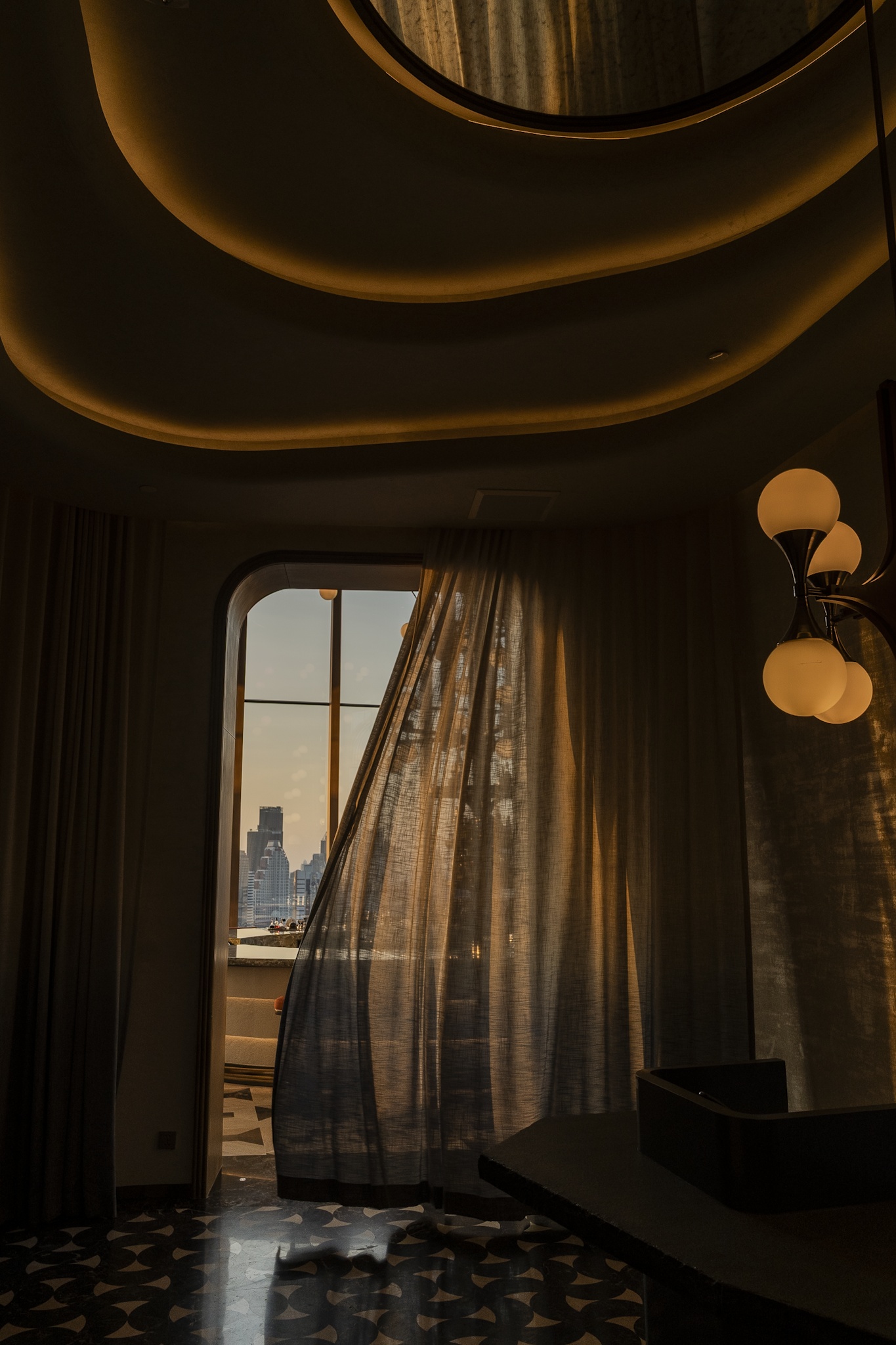 Moody arrival space at Piscari in Andaz One Bangkok
