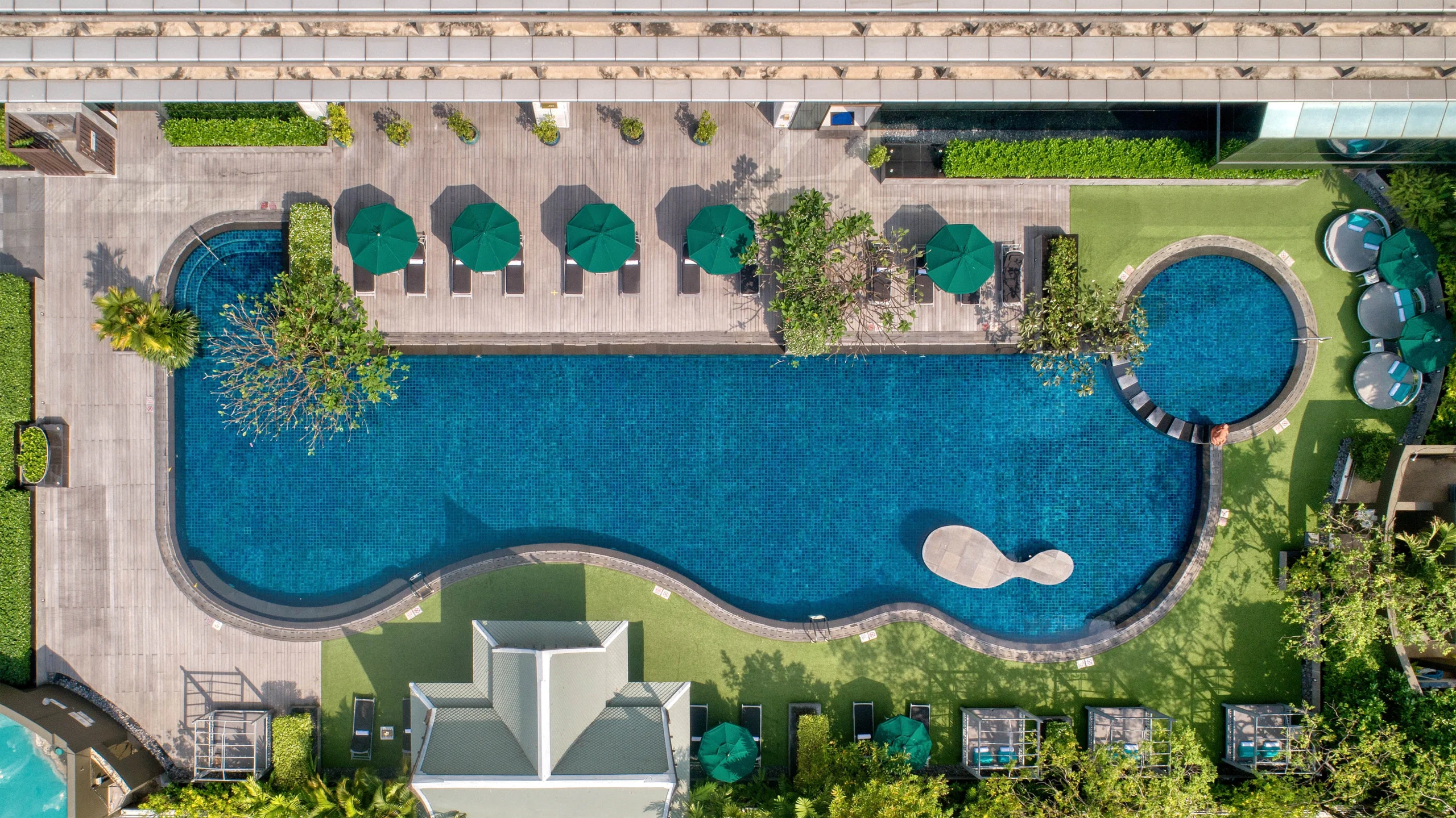 Lagoon-style rooftop swimming pool at The Athenee Hotel Bangkok
