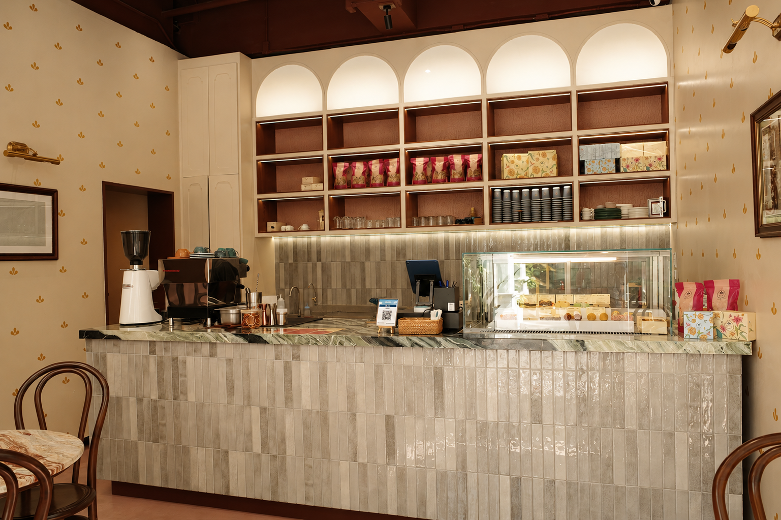 The Royals Cafe Bangkok counter with sweets and coffee service