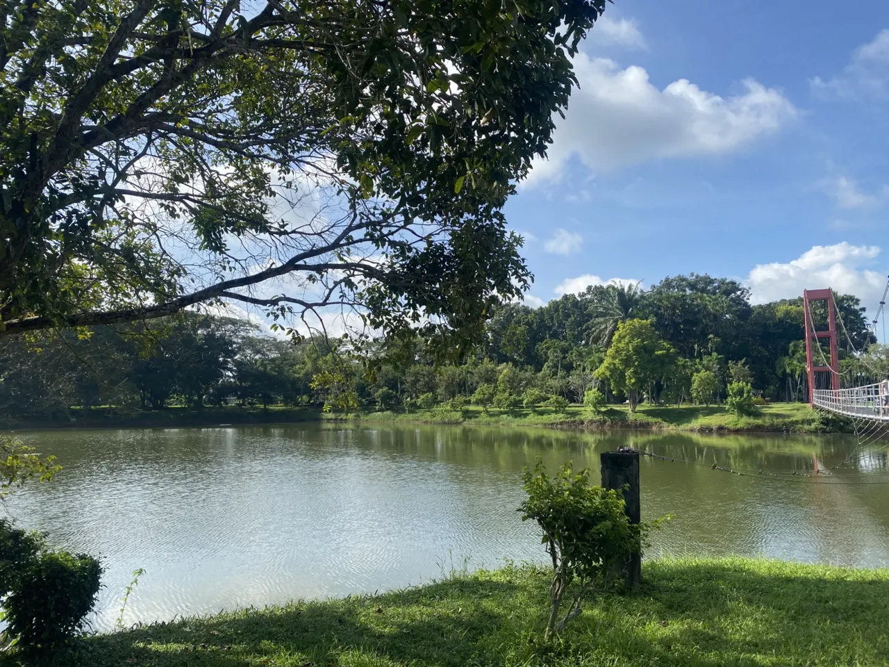 Lake and suspension bridge at Chaloem Phrakiat 95 Public Park