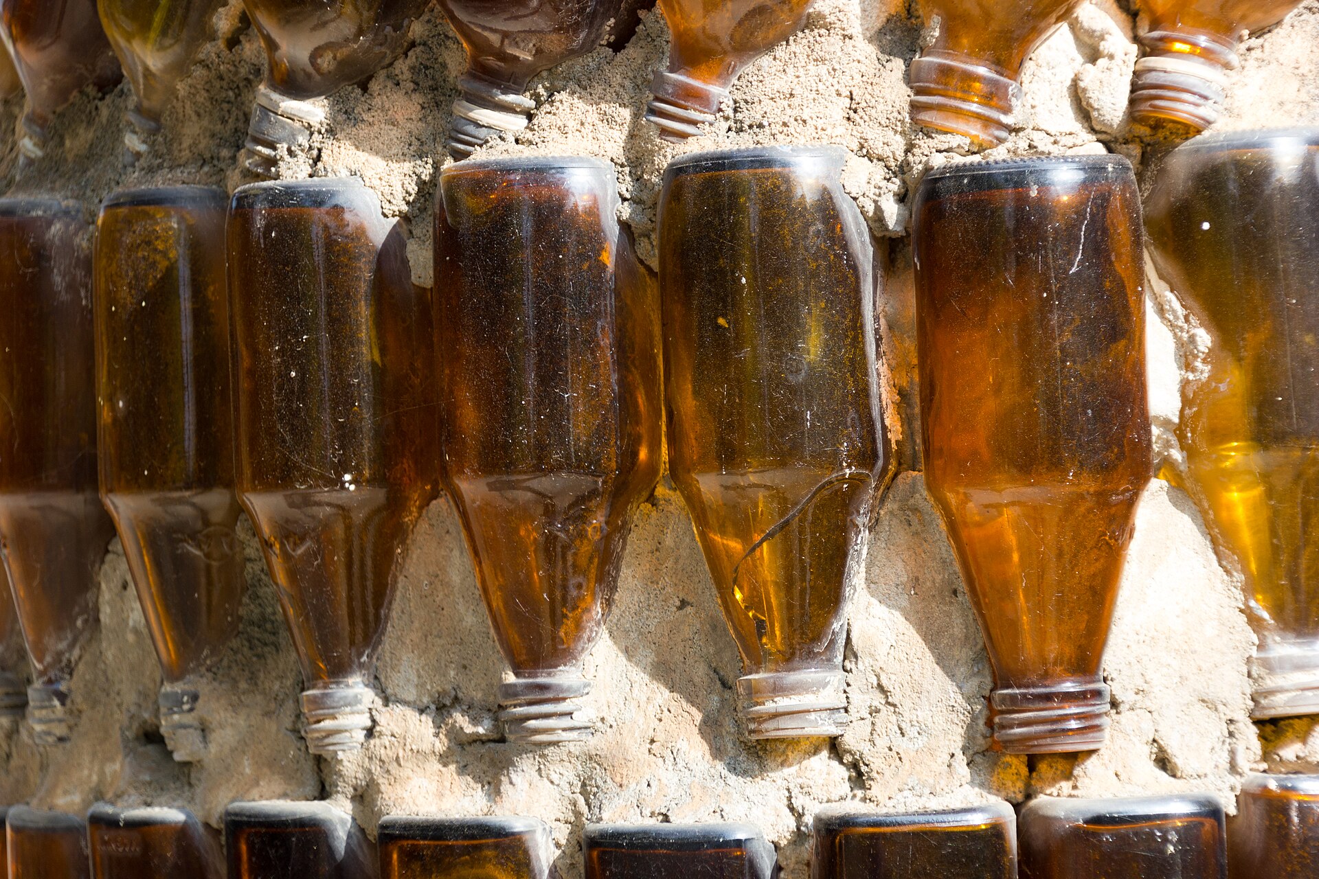 Close view of bottles used at Wat Pa Maha Chedi Kaew
