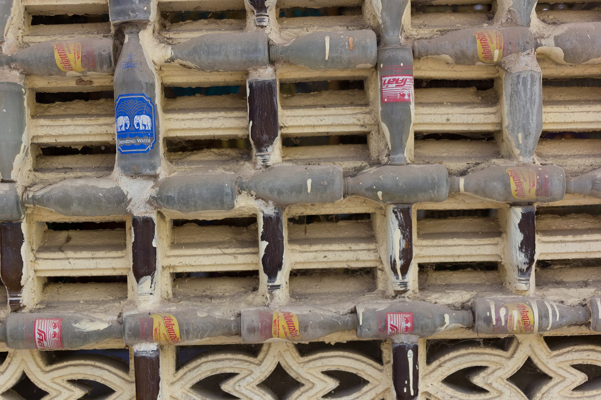 Detailed glass-bottle pattern at the Si Sa Ket temple