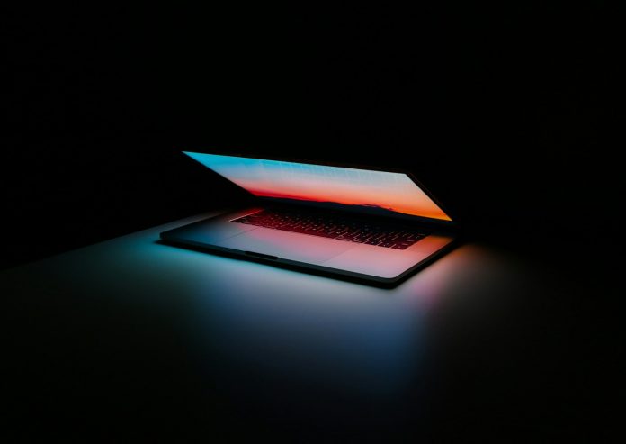 Laptop workspace Laptop used at a shared table