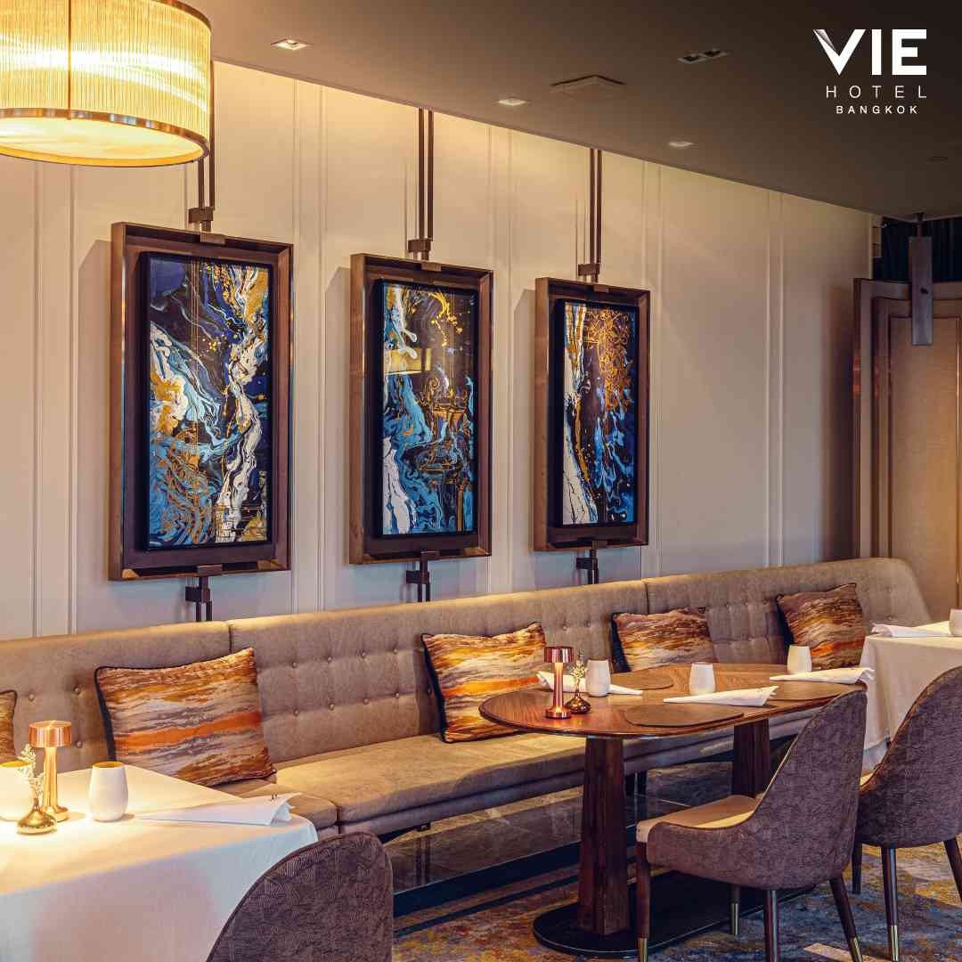 Table seating inside Signature Bangkok at VIE Hotel