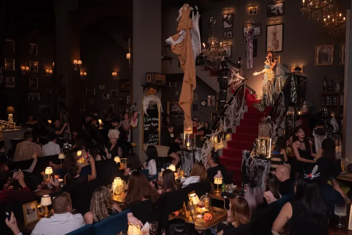 Crowd watching live performers inside Abandoned Mansion Bangkok
