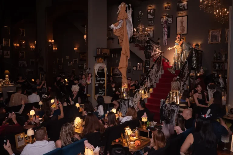 Crowd watching live performers inside Abandoned Mansion Bangkok