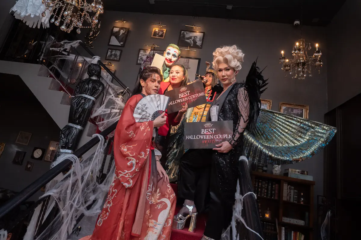 Guests in theatrical costumes at Abandoned Mansion Bangkok