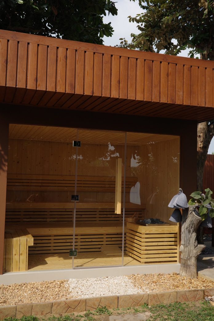 Cedar sauna and garden setting at Baan Ice Bath