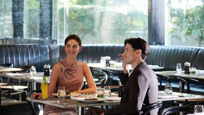 Café Claire dining room Couple dining in the bright Café Claire restaurant