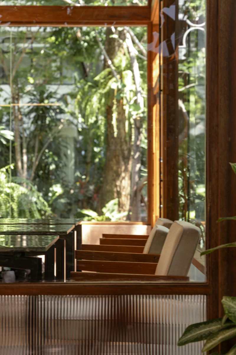 Leafy garden surrounding Cafe LOM in Rama 9